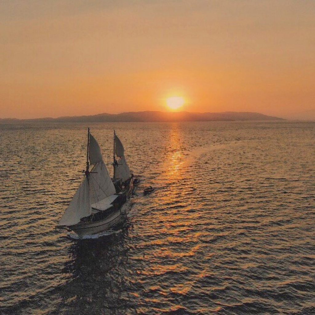 Nyaman-boat-cruising-during-sunset-time-at-komodo-flores-indonesia